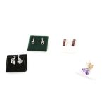 Four pairs of gold gem set earrings, two with set diamond hearts, garnet half hoops, and amethyst