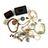 A group of costume jewellery, two silver and mother of pearl fruit knives, faux pearl necklace,