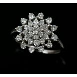 Modern diamond cluster ring, estimated total diamond weight 1.00 carat, mounted in 18 ct white gold,