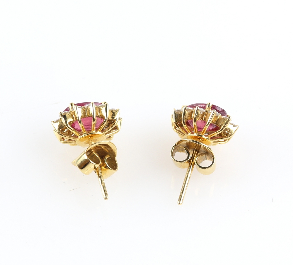 A pair of ruby and diamond earrings, oval faceted stones within a border of diamonds, in unmarked - Image 5 of 6