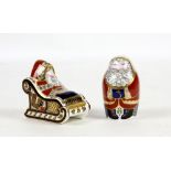 Royal Crown Derby paperweights Santa and Santa in sleigh (2 in lot). Overall condition good no