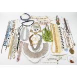 Large bag of costume jewellery, including a pair of rectangular earrings with cactus design, bead