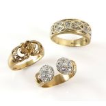 Three vintage rings, one diamond set band, another cubic zirconia set torque design, both size U and