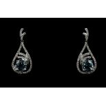 A pair of aquamarine and diamond drop earrings, mounted in 18 ct white gold, with post and butterfly