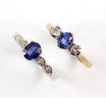 Two sapphire and diamond rings, one centrally set with an oval cut blue sapphire, 5.9 x 4.8mm,