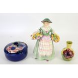 A Royal Doulton figure 'Daffy Down Dilly' (HN1712), together with a bud vase and lidded bowl with