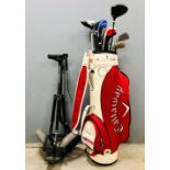 A quantity of golf clubs, Callaway special edition golf bag, Dunlop golf trolley, Titleist Pro V1