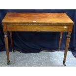 19th century folding card table on turned legs.