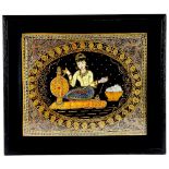 A Thai kalaga textile depicting a seated lady, wearing an elaborate chignon, head dress and costume,