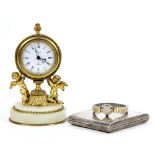 Tenso 9ct gold cased ladies wrist watch, white metal cigarette case and a Swiza cherub boudoir