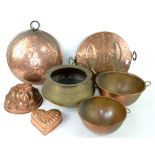 Art Deco copper kettle, lid moulded with fish, copper jelly mould, heart shaped copper mould, and