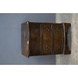 19th century oak mahogany cross banded chest of two short over three long drawers, a bookcase and