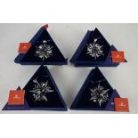 Swarovski, four Christmas Ornaments 2002.