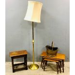 Oak joint stool, nest of three tables, brass coal bucket and a standard lamp. (4).