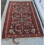 Afghan red ground rug 212cm x 127cm and another 183cm x 106cm .