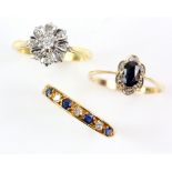 Three rings, a diamond cluster, size L, sapphire and diamond half eternity, size K, both mounted