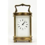 Brass and four glass carriage clock with lever movement, 16.5cm high, .