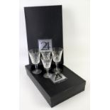 Glasses to include 6 Flutes 15cm, and 6 Waterford Cross Swirl wine glasses 17.5cm boxed.