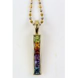 Multi gem set pendant, set with square cut peridot, citrine, garnet, amethyst, iolite and blue