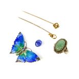 A group of costume jewellery including two stick pin stamped 15 ct, loose cabochon cut sapphire,