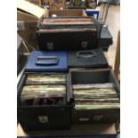 4 BOXES OF SINGLES AND 1 BOX OF LPs