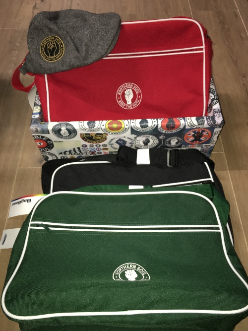 A NORTHERN SOUL STICKERED BOX WITH 3 NORTHERN SOUL BAGS AND A HAT