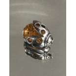 SILVER AND AMBER LADYBIRD BROOCH