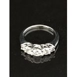 WHITE GOLD FIVE STONE DIAMOND RING APPROXIMATELY .