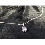 9CT WHITE GOLD TANAZANITE AA AND DIAMOND PENDANT AND 9CT WHITE GOLD CHAIN W3.