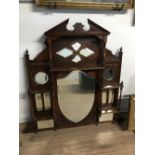 LATE 19THC CARVED WOOD OVERMANLTE MIRROR WITH SHIELD SHAPED MAIN MIRROR 132CM WIDE