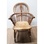 A BENTWOOD WINDSOR STYLE ARM CHAIR