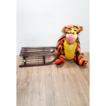 A VINTAGE WOOD SLEDGE AND LARGE SOFT TOY