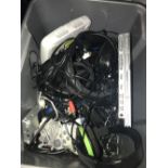 A BOX OF OLD CONSOLES INC PS1 PS2 GAMEBOY ADVANCE AND TURTLE BEACH HEADSET ETC