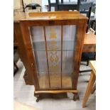 AN INLAID CHINA CABINET