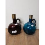 TWO SCOTTISH COLOURED GLASS SPIRIT JUGS WITH SILVER PLATED TOPS