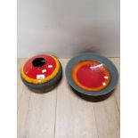 A BOWL AND MATCHING VASE IN A VOLCANIC DECOR