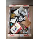 A CRATE OF SEWING MATERIALS AND BUTTONS ETC