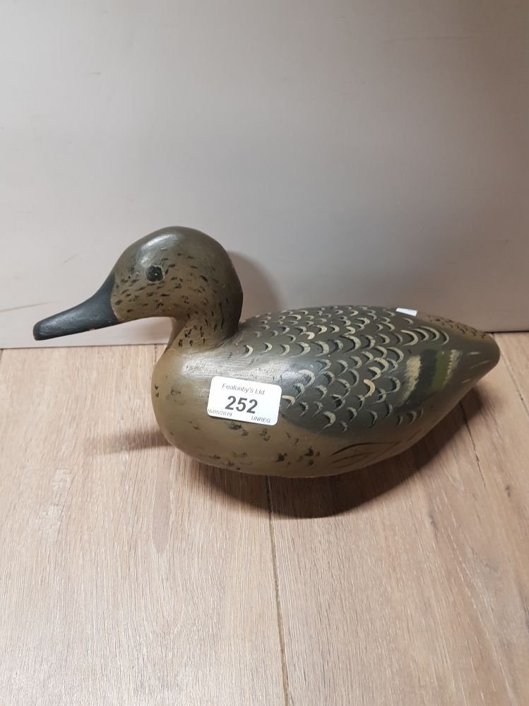 A HAND PAINTED WOODEN CARVED DUCK DECOY