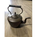 A VINTAGE COPPER KETTLE