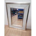 A MODERN HESSIAN FRAMED MIRROR