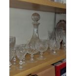 A SUBSTANTIAL AMOUNT OF GLASS WARE INC DECANTERS AND WINE GLASSES ETC