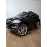 A KIDS ELECTRIC REMOTE CONTROL BMW X6 CAR