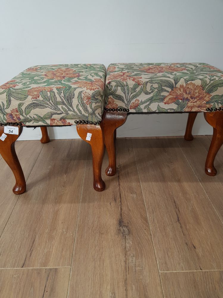 A PAIR OF 2 METAL STUDDED UPHOLSTERED METAL STUDDED FLORAL PATTERNED FOOTSTOOLS