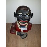 CAST IRON JOLLY BLACK MAN MECHANICAL BANK