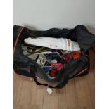 A GREY NICOLLS BAG CONTAINING CRICKET GEAR