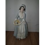 A ROYAL DOULTON FIGURE FROM THE REFLECTIONS COLLECTION SWEET VIOLETS