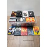 A BOX OF DVDS