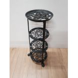 A CAST IRON FOUR TIER POT STAND