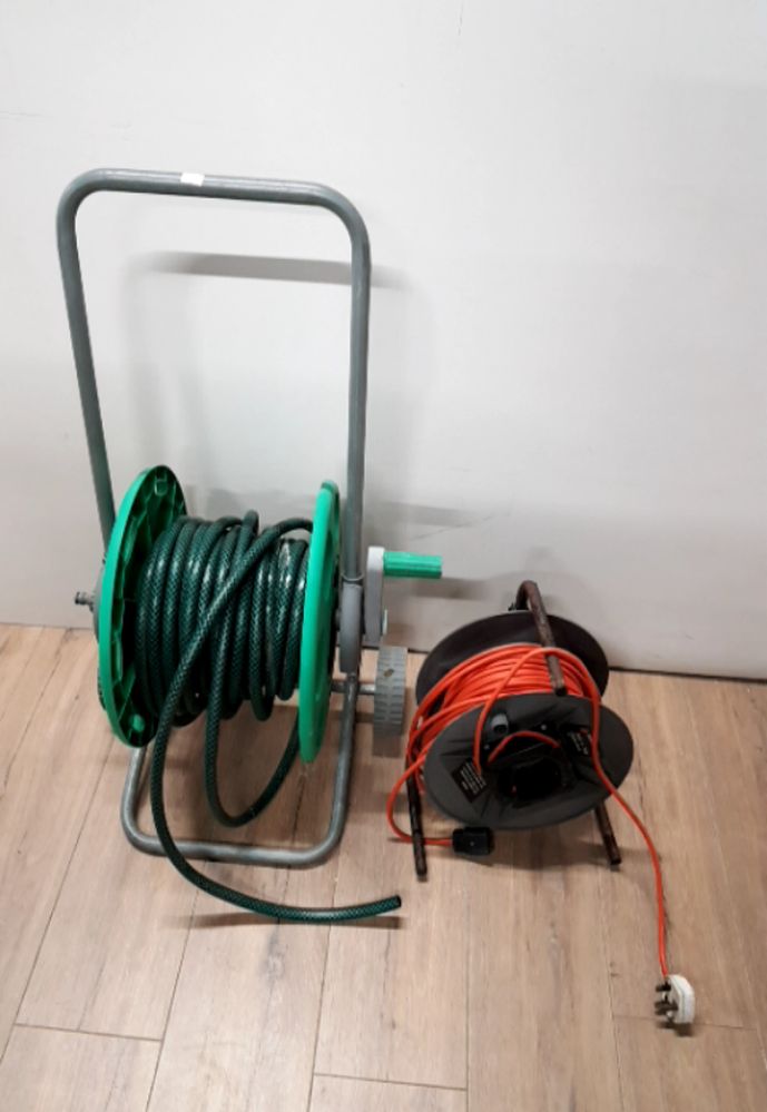 A HOSE PIPE ON REEL TOGETHER WITH AN EXTENSION