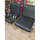 A PAIR OF MODERN BLACK LEATHER SEATS WITH CHROME BASE